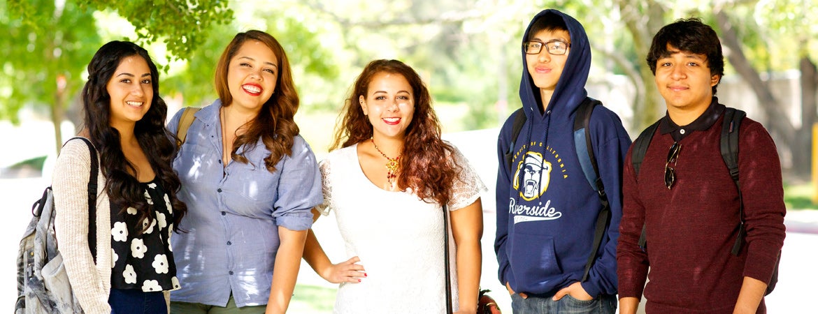 A group of UCR students pose for a picture on the campus. 